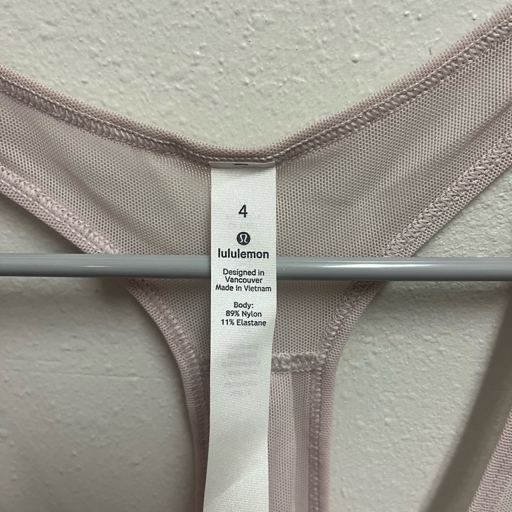 Lululemon pink mesh workout top. Never been worn. - Picture 2 of 5